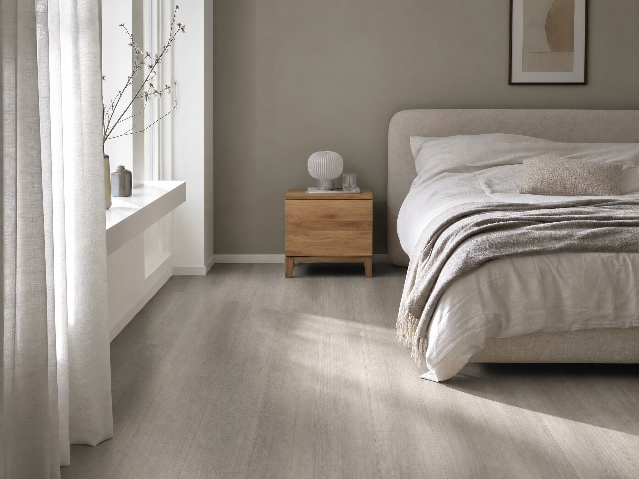 Lichte slaapkamer met wit-look laminaat